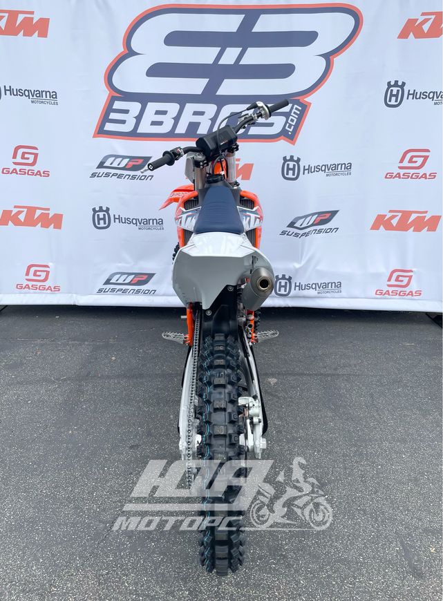 Мотоцикл KTM 125 SX, Белый с сине-оранжевый